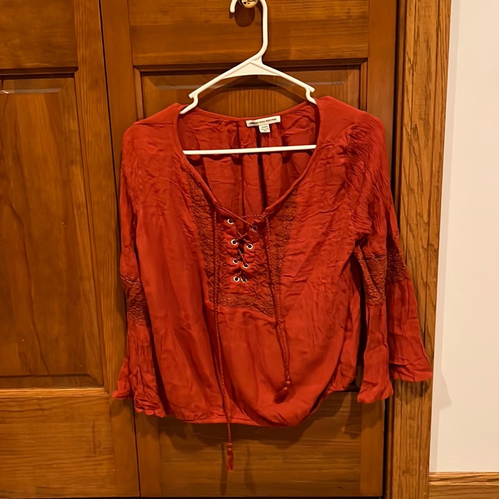 Red/orange blouse